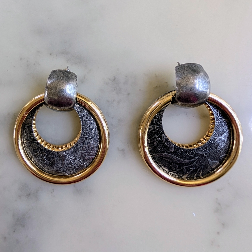 NWOT. Silver and Gold Triple Hoop Earrings with Textured Design.